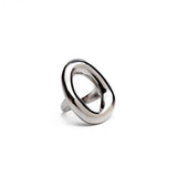 Chunky stainless steel ring with a modern donut shape, featuring a shiny silver finish and irregular outline.