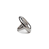 Chunky silver stainless steel ring with an irregular circular design, showcasing a high-shine modern look.