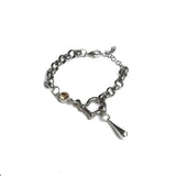 Chunky stainless-steel rolo chain bracelet with a shackle and a tea-colored Austrian crystal pendant.