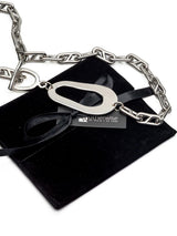 Chunky stainless steel anchor chain necklace with an abstract irregular pendant and T-bar toggle clasp.