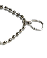 Chunky silver ball chain choker featuring an oversized design with a hammered loop pendant and adjustable fit.