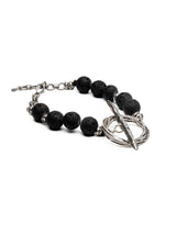 Chunky black lava stone choker necklace featuring a bold oversized T-clasp toggle, perfect for edgy or boho styles.