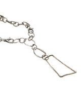 Asymmetrical silver plated necklace featuring a large irregular loop pendant and chunky carabiner clasp.