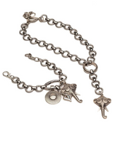 Silver bracelet with elephant charms on a white background