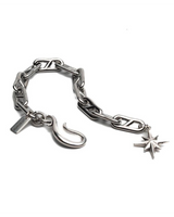 Silver chain bracelet with star and hook charms on a white background