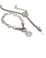 Antique plated steel choker and long necklace set featuring a tiger head pendant, with cable and snake chain designs.