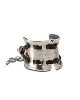 Silver ring with leather straps on a white background