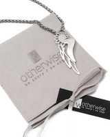 Silver necklace with angel wing pendant on a 'otherwise' branded card.