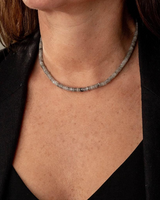 Necklace worn by a person with a neutral background
