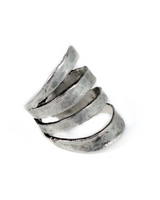 Funky hammered silver-plated metal ring with adjustable spiral design, showcasing an edgy and unique style.