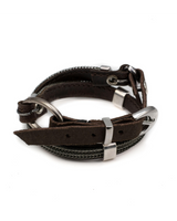 Brown leather bracelet with silver hardware on a white background
