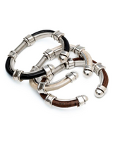 Zamak Metal Leather Cuff Bracelet featuring black, white, and brown leather accents with silver zamak fittings and a spring closure.