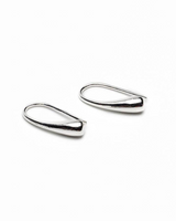 Pair of silver earrings on a white background