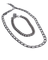 Three-piece layered necklace set featuring sleek stainless steel chains and dark polished gemstones.