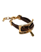 Bracelet with gold clasp and dark brown leather strap on a white background