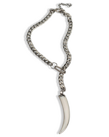Silver chain bracelet with a tusk pendant on a white background