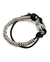 Bracelet with metal beads and black leather strap on a white background
