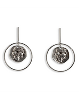 Contemporary statement earrings featuring silver-toned hoops with replicas of ancient Greek coins.