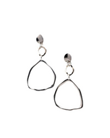 Hammered triangle dangle earrings in silver, featuring a unique geometric design with oval stainless steel studs.