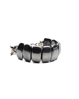 A bracelet made of polished dark metallic cylindrical beads linked together with a silver-toned clasp, shown on a plain white background.