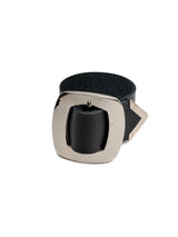 Wide black leather cuff bracelet featuring a large silver buckle, offering an edgy and punk-inspired look.