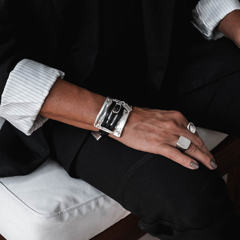 Bracelet with soft black leather strips and metal design (BR-488)