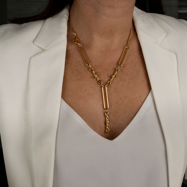 Edgy Chic gold necklace, Funky double knot necklace