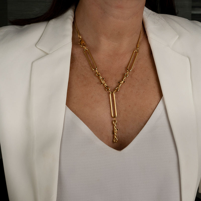 Edgy Chic gold necklace, Funky double knot necklace