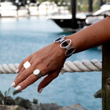 Unique unode50 style bracelet, Standout black leather and oval metal elements cuff for your every day look.