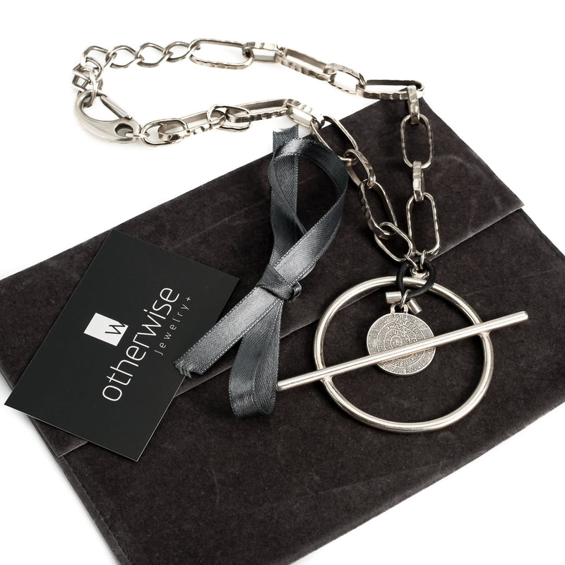 Chunky women's chain necklace with bar closure and coin pendant