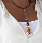 Statement necklace with Austrian crystal pendant,  Standout astral pink crystal stone Necklace with leather and metal