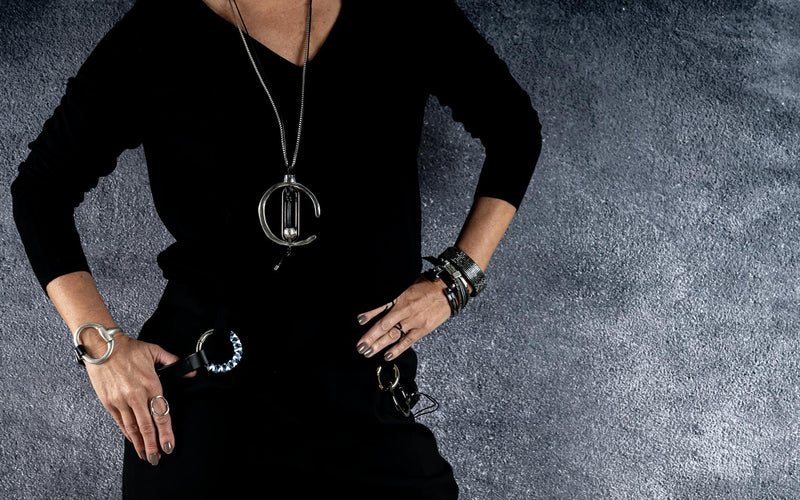Necklace with unique asymmetrical metal design, created in the Uno de 50 style
