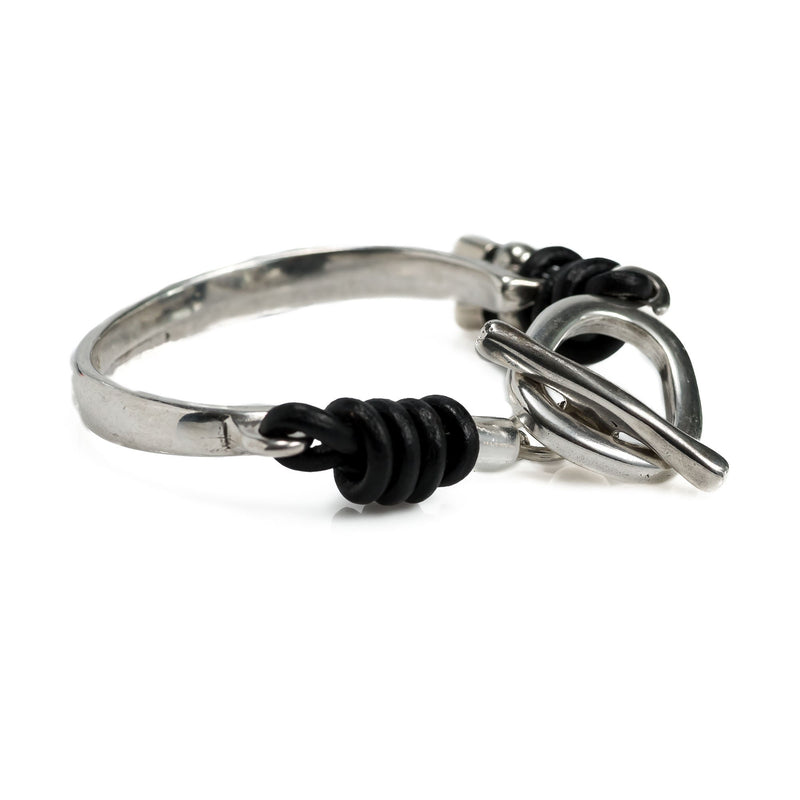 Cuff bracelet with leather and an asymmetric bar clasp, Unique women's bracelet for gift.