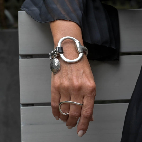Unode50 style bracelet, Standout black leather and horsebit metal, Equestrian cuff bracelet
