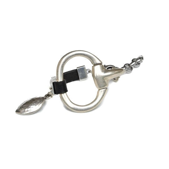 Unode50 style bracelet, Standout black leather and horsebit metal, Equestrian cuff bracelet