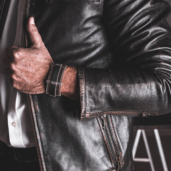 Men’s leather and metal bracelet combined for a strong look