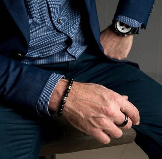 Black glass beaded bracelet with metal details for men