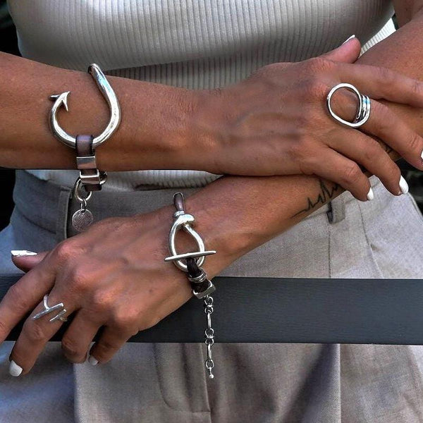 Bold metal and leather bracelets, Unisex edgy statement bracelets, Unode50 style cuff, Arrow and knot standout bracelets