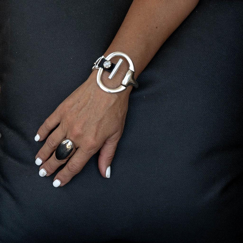 Standout black leather and horsebit metal, Equestrian cuff bracelet, Unode50 style bracelet, Chunky brutalist jewelry