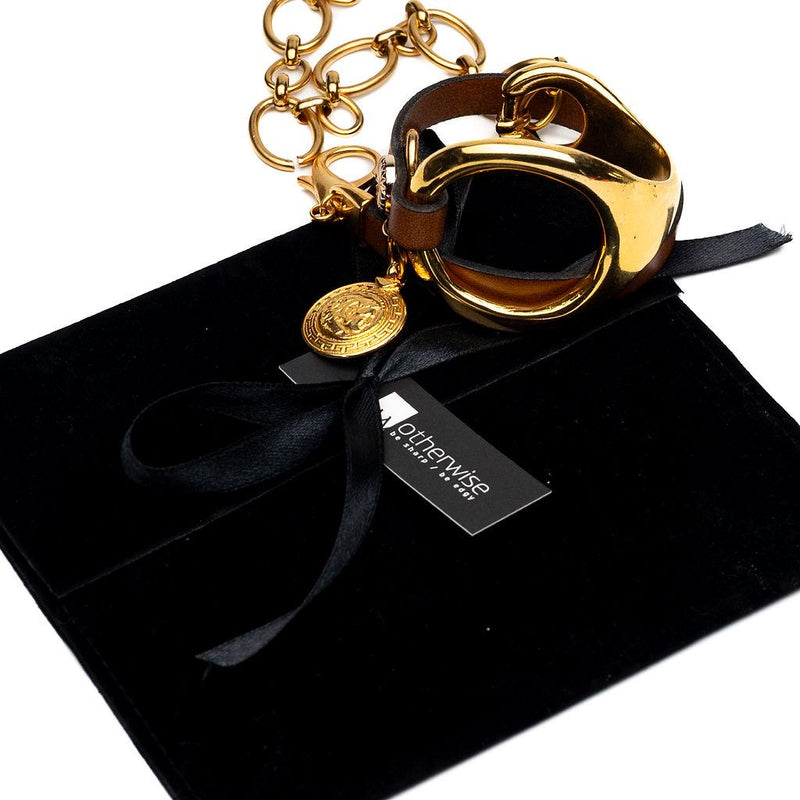 Gold triple wrap bracelet with beige leather in Unode50 style, Metal and leather cuff with stainless steel chain for a Sharp and Chic look