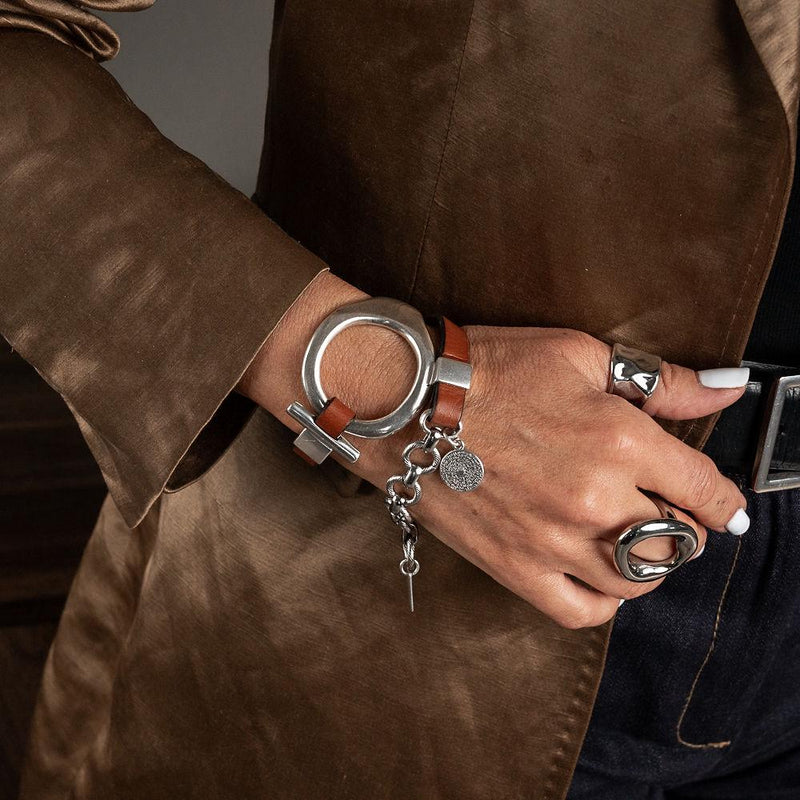 Unique double wrap bracelet in Unode50 style, Metal and leather cuff with stainless steel chain for a Sharp and Chic look. A standout piece!
