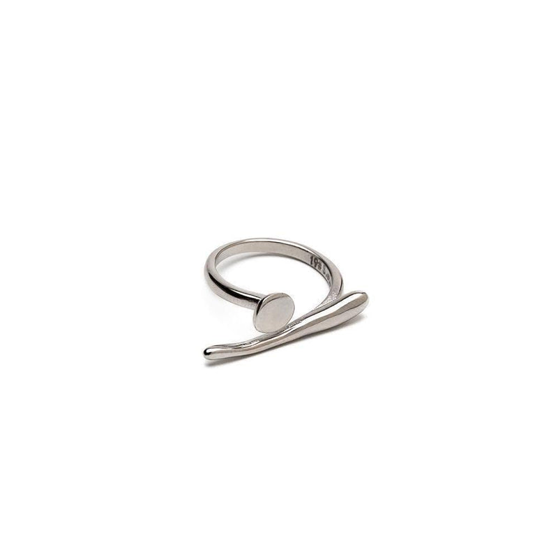 A modern gold statement ring, an edgy-chic stainless steel ring, asymmetrical minimalistic art worn on your finger