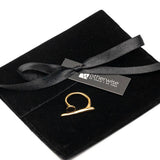 A modern gold or silver statement ring, an edgy-chic stainless steel ring, asymmetrical minimalistic art worn on your finger
