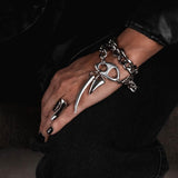 Statement stainless steel chain wrap bracelet with oversized pendant teeth