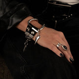 Striking metal and leather bracelet, unisex edgy and unique jewelry