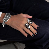 Adjustable silver snake ring with chunky curved open wrap design in smooth silver-plated metal