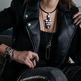Statement black leather necklace with metal bars in rock style