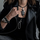 Statement black leather necklace with metal bars in rock style