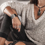 Statement black leather necklace with metal bars in rock style