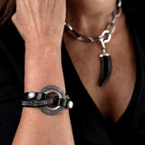 Bold textured disc bracelet with leather and strass, rock style statement bracelet for a strong look